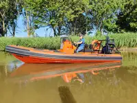 Жесткая надувная лодка на продажу